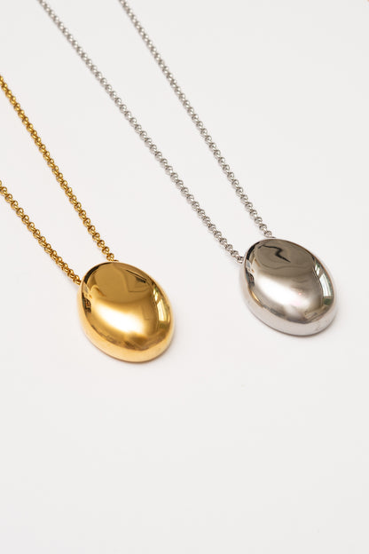 gold and silver mirror finish minimal pendant necklaces on white background