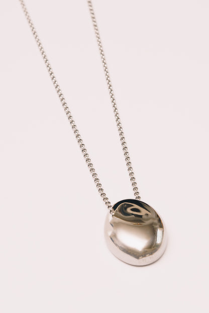 silver finish layering necklace minimal pendant necklace on white background