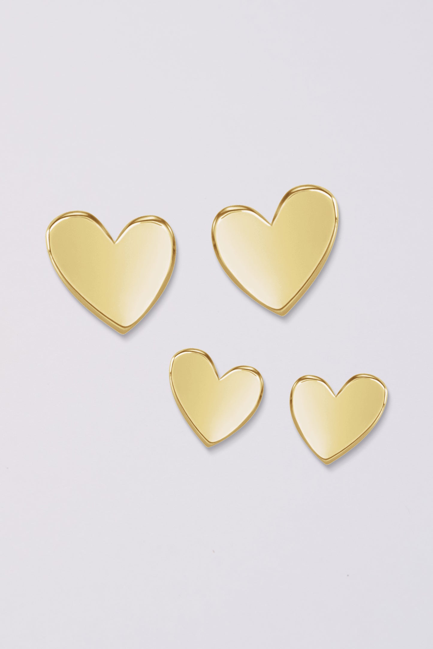 Asymmetric tiny heart studs | 14K Gold